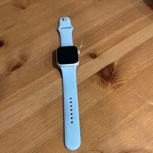 Apple Smartwatch S 8, Starlight Aluminum, cell capable,45MM w/ light green band.